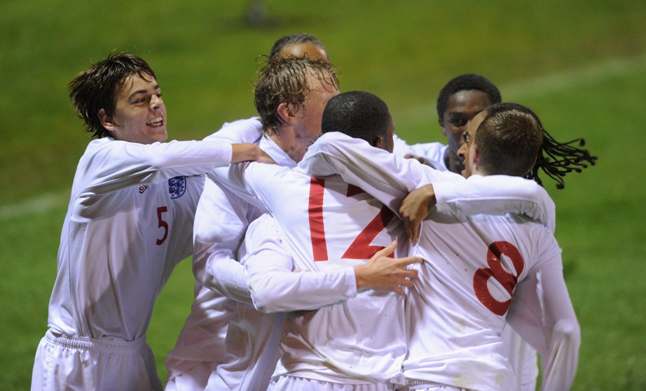 Zak Ansah's England team-mates congratulate him on scoring the winner against Wales in the Victory Shield.